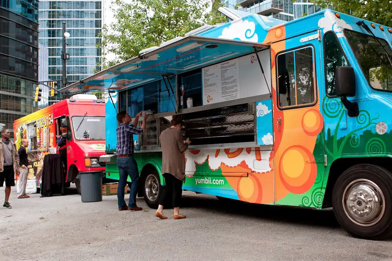 Customers Order Meals From a Food Truck 